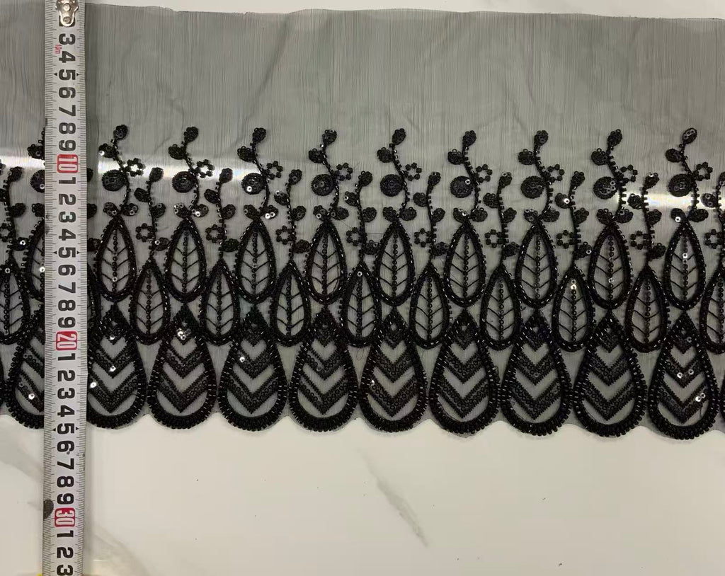 Original unedited sample photograph; reference for exact embroidery and embellishment details.