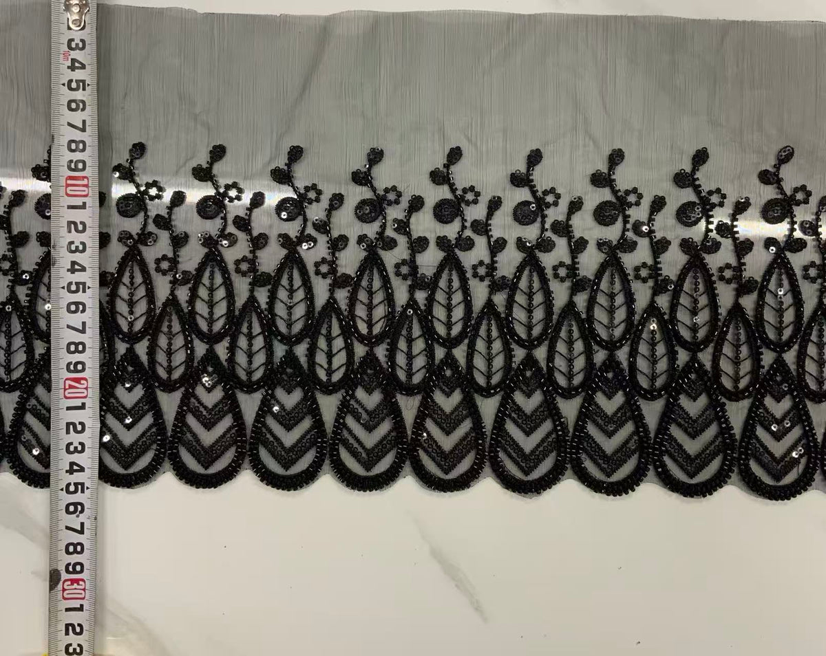 Original unedited sample photograph; reference for exact embroidery and embellishment details.