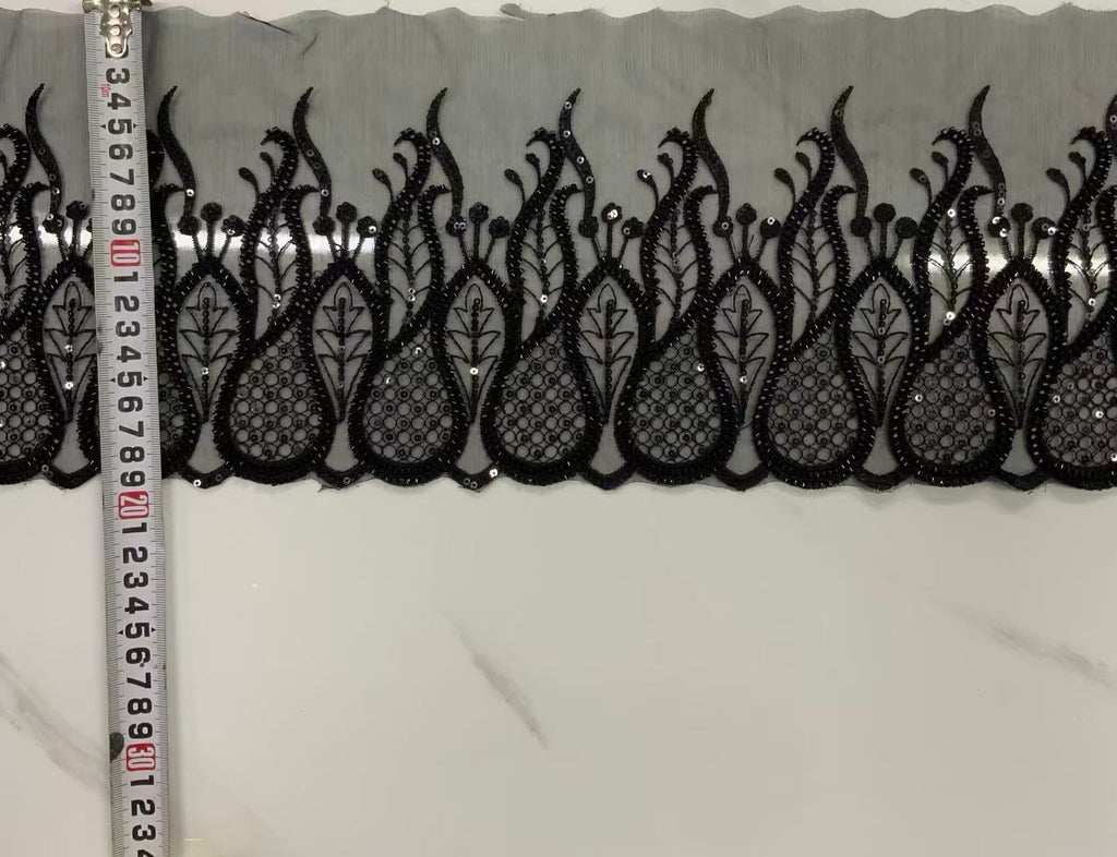 Original unedited sample photograph; reference for exact embroidery and embellishment details.